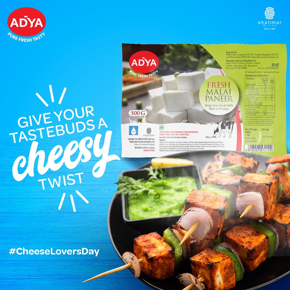 Adya Dairy Cheese Lovers Day campaign showcasing Fresh Malai Paneer packaging alongside grilled paneer tikka skewers and green chutney.